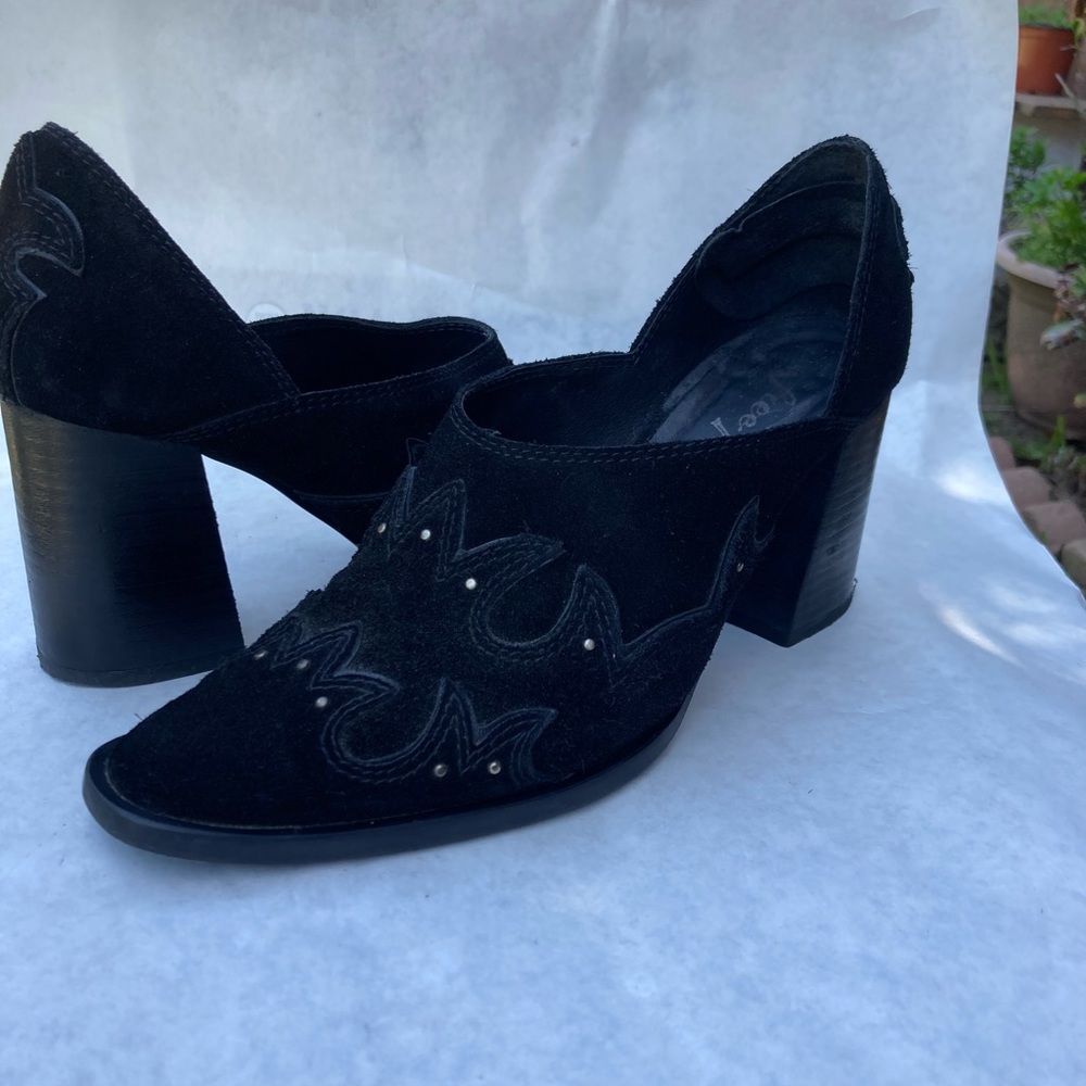 Free People black angled heel very detailed suede shoes. Only worn 4 times.
